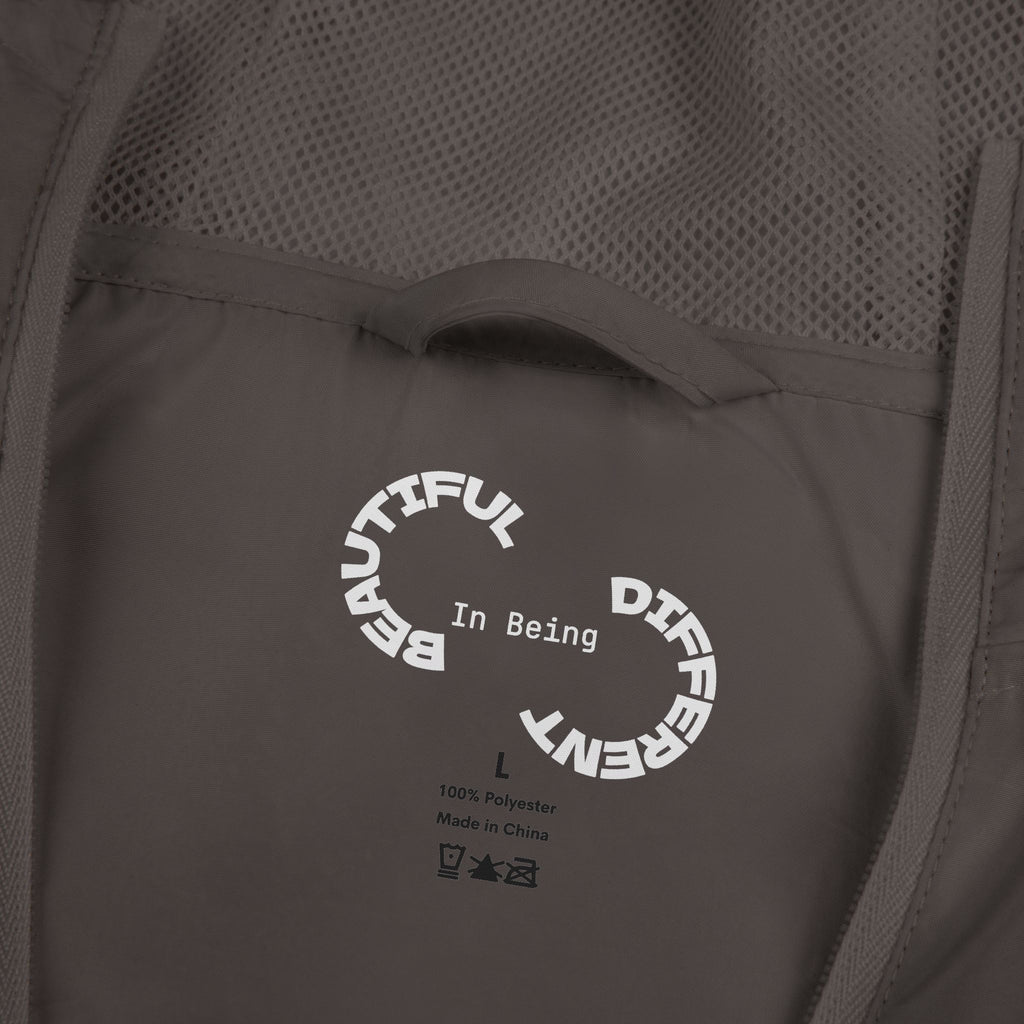 PENGU Windbreaker Jacket — 'Beauty Seen Different Being' Graphic Hooded Windbreaker